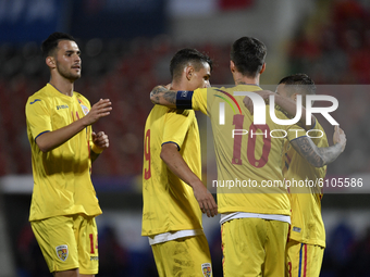 Marius Marin, George Ganea, Dennis Man and Alexandru Matan of Romania U21 celebrate during the soccer match between Romania U21 and Malta U2...