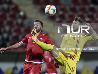 Denis Dragus of Romania U21 in action during the soccer match between Romania U21 and Malta U21 of the Qualifying Round for the European Und...