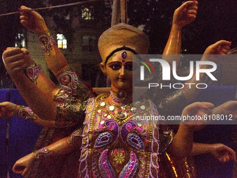 An idol of the Hindu goddess Durga in a workshop before final touching ahead of the Durga Puja festival at CR Park, on October 20, 2020, in...