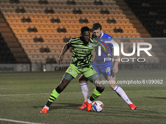 Colchesters Tom Eastman And Forest Greens Jamille Matt  during the Sky Bet League 2 match between Colchester United and Forest Green Rovers...