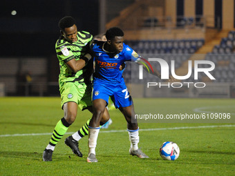 Colchesters Kwame Poku  and Forest Greens Vdoka Godwin-Malife battle for the ball during the Sky Bet League 2 match between Colchester Unite...