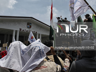 Indonesian Unions held a protest against government's new job law (Omnibus Law) on job creation in Bogor, West Java, on October 21, 2020. De...