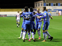   Dior Angus of Barrow celebrates with his team mates after scoring their third goal  during the Sky Bet League 2 match between Barrow and B...
