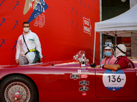 Drivers of historic cars start the La Festa Mille Miglia in Brescia, Italy on October 21, 2020. Although the departure is still in doubt, pr...