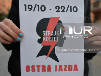Pro-Choice activist with a logo of the 'Women Strike', seen in the center of Krakow, part of the Coronavirus Red Zone, during a protest agai...