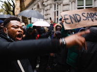 Activists protesting police brutality by the Nigerian Special Anti-Robbery Squad (SARS) demonstrate outside the Nigerian High Commission on...