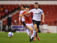 
Joe Lolley of Nottingham Forest battles with Richard Wood of Rotherham United during the Sky Bet Championship match between Nottingham Fore...