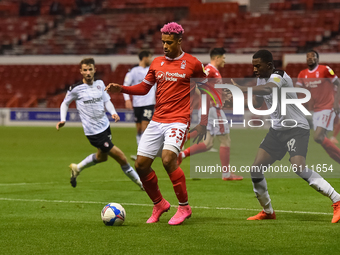 
Lyle Taylor of Nottingham Forest shields the ball from Wes Harding of Rotherham United during the Sky Bet Championship match between Nottin...