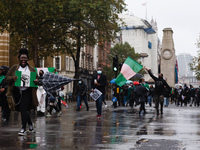 Activists protesting police brutality by the Nigerian Special Anti-Robbery Squad (SARS) march along Whitehall in London, England, on October...