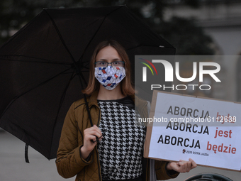 Pro-Choice activists seen in the center of Krakow, part of the Coronavirus Red Zone, during a protest against a proposed law that prohibits...