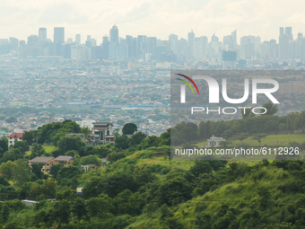 Air pollution in Metro Manila's Skyline is visible at the top of Cabrera Road, Antipolo City, today October 22, 2020. After months of Enhanc...