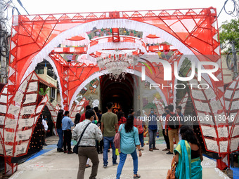 Visitor at a community a temporary structure to perform  during the Hindu festival 'Durga Puja' celebrations, in Kolkata on October 22, 2020...