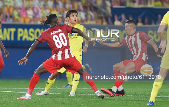 Takefusa Kubo of Villarreal CF and Olarenwaju Kayode of Sivasspor during the Europa League Group I mach between Villarreal and Sivasspor at...