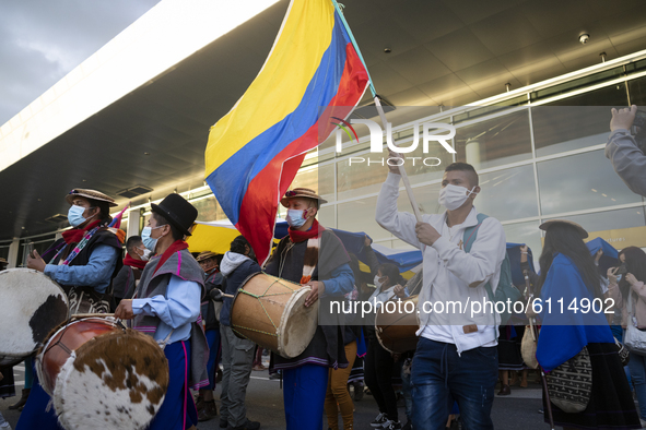 Indigenous people from the Misak, Pijao and Nasa take part with songs, dances and musical interventions inside the El Dorado Airport in Bogo...