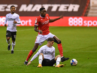 
Sammy Ameobi of Nottingham Forest battles with Tom Lawrence of Derby County during the Sky Bet Championship match between Nottingham Forest...