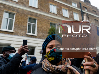 A group of people gather to protest against brutality of Nigerian Special Anti-Robbery Squad (SARS) in London, Britain, 24 October 2020. UN...