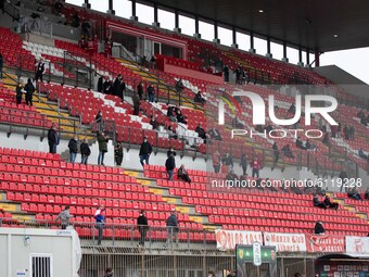 The grandstand of the Brianteo stadium in Monza with spectators distanced according to the anti-covid rules during the training at Serie B m...