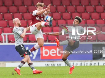 Northampton Town's Sam Hoskins is challenged by Charlton Athletic's Jonathan Williams during the first half of the Sky Bet League One match...
