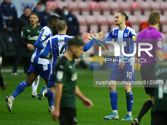 Wigans Will Keane celebrates making it 1-1 during the Sky Bet League 1 match between Wigan Athletic and Plymouth Argyle at the DW Stadium, W...