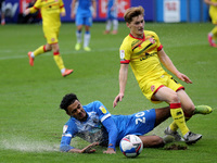 Dior Angus of Barrow in action with Walsall's Alfie Bates during the Sky Bet League 2 match between Barrow and Walsall at the Holker Street,...