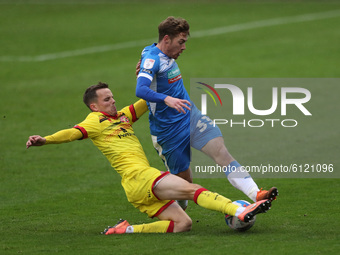 Luke James of Barrow in action with\ Walsall's Liam Kinsella during the Sky Bet League 2 match between Barrow and Walsall at the Holker Stre...