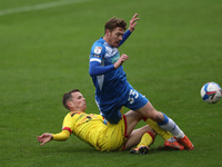 Luke James of Barrow in action with\ Walsall's Liam Kinsella during the Sky Bet League 2 match between Barrow and Walsall at the Holker Stre...