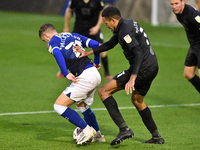 Oldham Athletic's Alfie McCalmont and Port Vale's Cristian Montano in action during the Sky Bet League 2 match between Oldham Athletic and P...