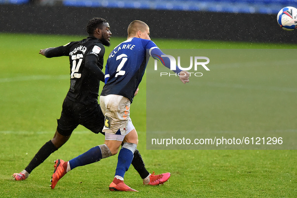 Oldham Athletic's Harry Clarkea and Port Vale's Theo Robinson in action during the Sky Bet League 2 match between Oldham Athletic and Port V...