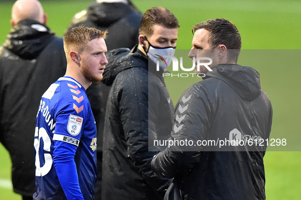 Oldham Athletic's Davis Keillor Dunn and Alan Maybury (assistant head coach) during the Sky Bet League 2 match between Oldham Athletic and P...