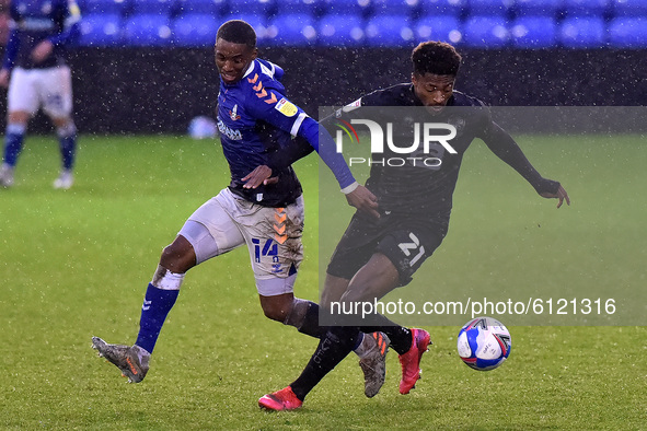 Oldham Athletic's Dylan Fage and Port Vale's Devante Rodney in action during the Sky Bet League 2 match between Oldham Athletic and Port Val...