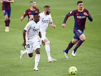 Vinicius Junior, Karim Benzema and Clement Lenglet during the match between FC Barcelona and Real Madrid CF, corresponding to the week 7 of...
