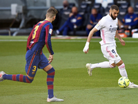 Karim Benzema and Gerard Pique during the match between FC Barcelona and Real Madrid CF, corresponding to the week 7 of the Liga Santander,...