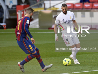 Karim Benzema and Gerard Pique during the match between FC Barcelona and Real Madrid CF, corresponding to the week 7 of the Liga Santander,...