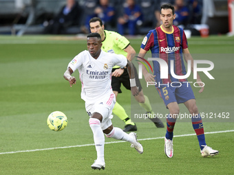 Vinicius Junior and Sergio Busquets during the match between FC Barcelona and Real Madrid CF, corresponding to the week 7 of the Liga Santan...