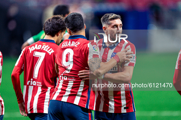 Joao Felix, Luis Suarez and Hector Herrera celebrates a goal during La Liga match between Atletico de Madrid and Real Betis at Wanda Metropo...