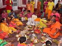 Young girls dress as Living Goddess Kumari participate during the Kumari Puja as part of Navratri - a festival of nine days when devotees wo...