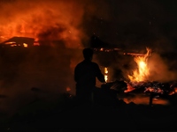 Massive fire broke out in a residential house at Neharpora area of north Kashmir’s Sopore town in District Baramulla, Jammu and Kashmirm, In...