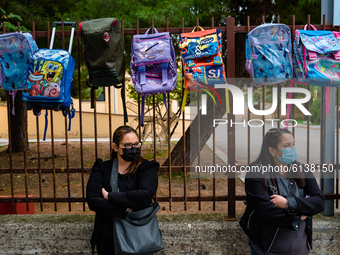 Backpacks hanging in front of the Poli Middle School in Molfetta, for the parents' protest at the closure of the schools on October 30th 202...