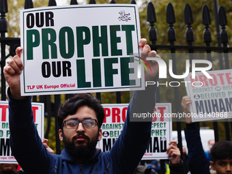 Demonstrators opposing the publication in France of cartoons of the Prophet Mohammad protest outside the French Embassy in London, England,...