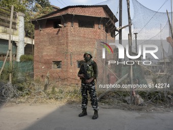 An Indian pareamillitary trooper stands alert outside bunker during shutdown in Srinagar, Indian Adminsitered Kashmir on 31 October 2020. Sh...