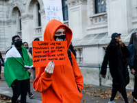 A group of people gather to protest against brutality of Nigerian Special Anti-Robbery Squad (SARS) in London, Britain, 31 October 2020. UN...