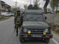 An Indian tropper stands near encounter site in Rangreth area on the outskirts of Srinagar, Kashmir on 01 November 2020. Top millitant comma...
