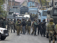 Indian forces remain alert near encounter site in Rangreth area on the outskirts of Srinagar, Kashmir on 01 November 2020. Top millitant com...