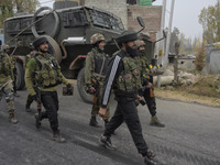 Indian forces leave from the encounter site in Rangreth area on the outskirts of Srinagar, Kashmir on 01 November 2020. Top millitant comman...