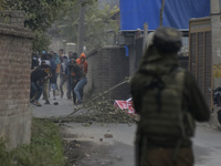 Kashmiri protesters clash with Indian forces near encounter site in Rangreth area on the outskirts of Srinagar, Kashmir on 01 November 2020....