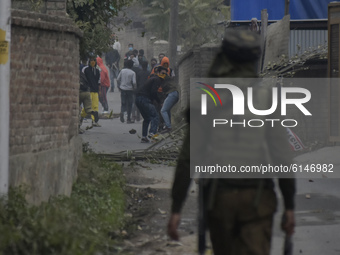 Kashmiri protesters clash with Indian forces near encounter site in Rangreth area on the outskirts of Srinagar, Kashmir on 01 November 2020....