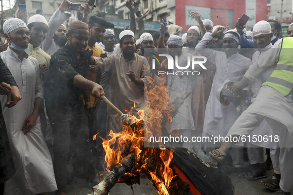 Supporters and activists of the Hefazat-e-Islam Bangladesh, an islamist political party, march towards a French embassy as they take part in...
