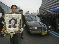 WWII Comfort Women Victim Park Bok-Soon funeral lines marching at Topgol park in Seoul, South Korea on January 31, 2005. Comfort women were...