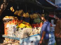People purchase Fruits on the outskirts of Jammu City, Jammu and Kashmir, India on 01 November 2020 amid Covid-19 Coronavirus Pandemic. (