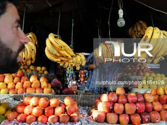 People purchase Fruits on the outskirts of Jammu City, Jammu and Kashmir, India on 01 November 2020 amid Covid-19 Coronavirus Pandemic. (